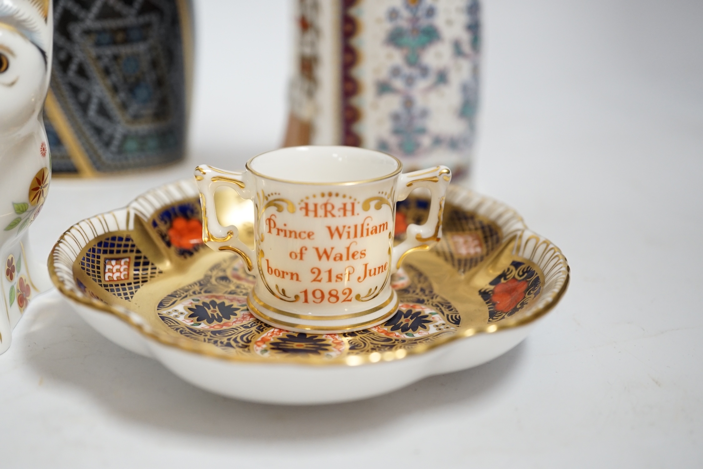 A collection of Royal Crown Derby porcelain and paperweights including Pearly Queen, Pearly King, Russian, etc.
